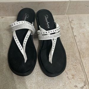 Thong sandal wedge heel . White with rhinestones.